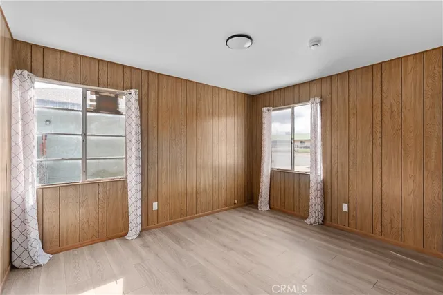a view of a livingroom with wooden floor