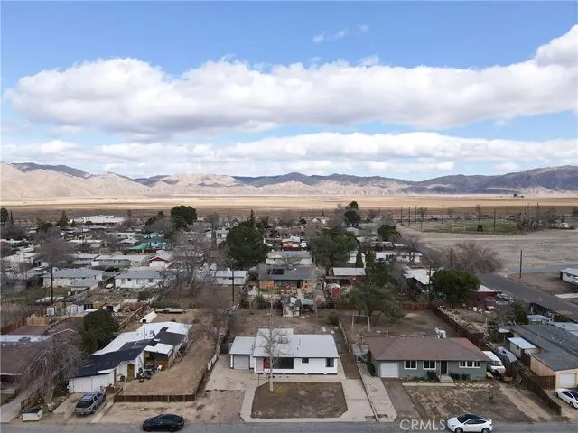 with aerial view of house with yard