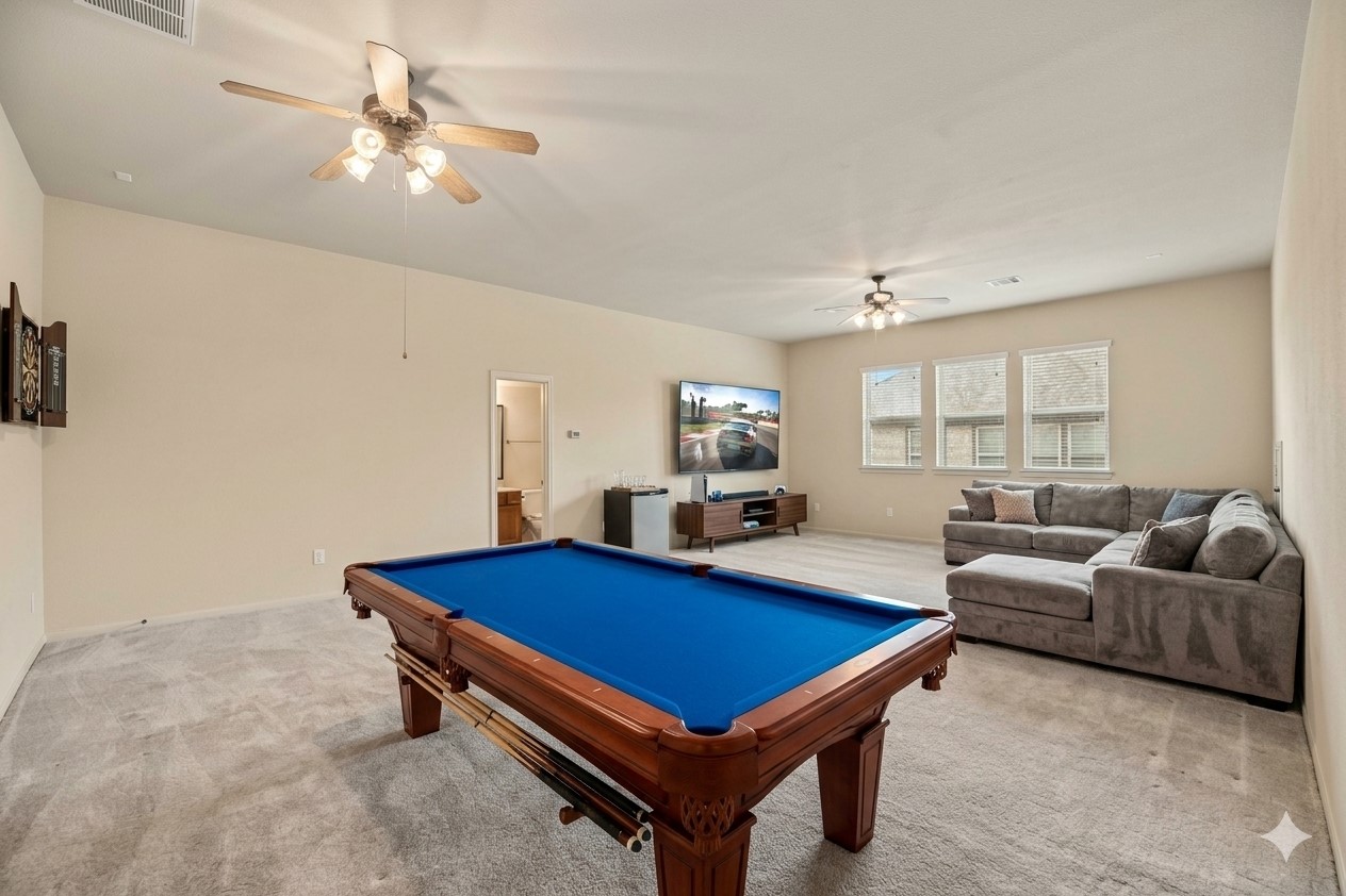 62 Sandwell Place Spring, TX 77389 - Photo 26 of 50 Here is the 2nd floor space shown as a gameroom and media room. Virtually staged.