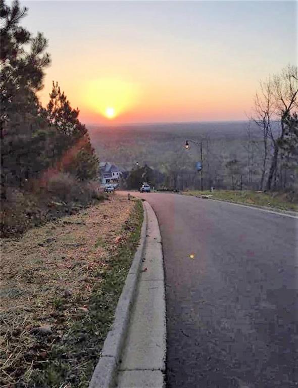 5005 Pindos Trail Southwest Powder Springs, GA 30127 - Photo 8 of 8 a view of a road with an ocean view