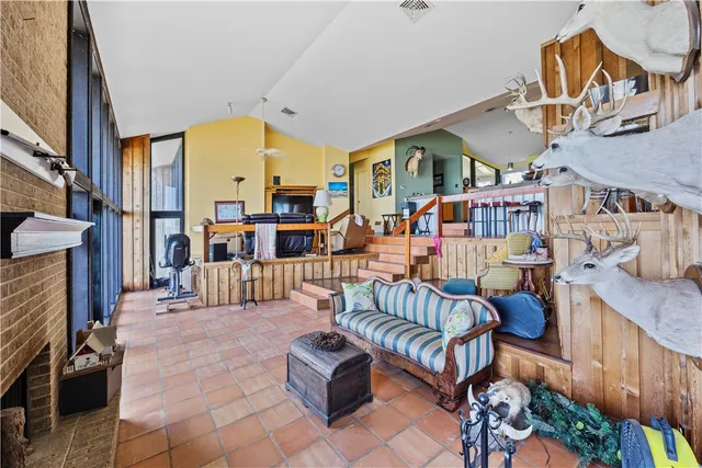 a view of a chairs and tables in the patio