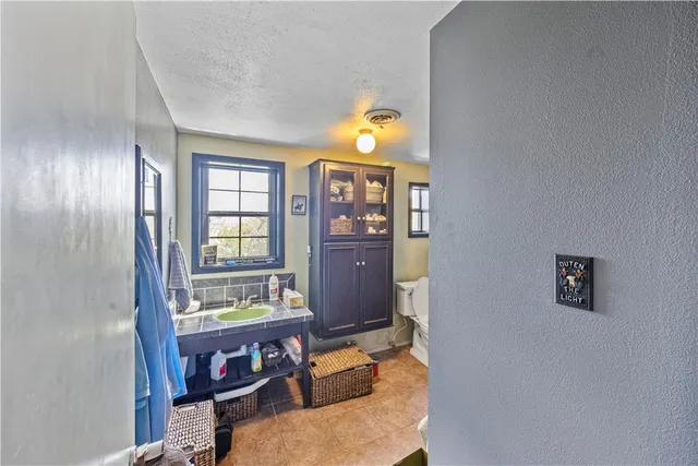 a living room with furniture and window