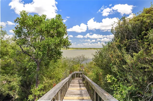 a view of a lake from a balcony