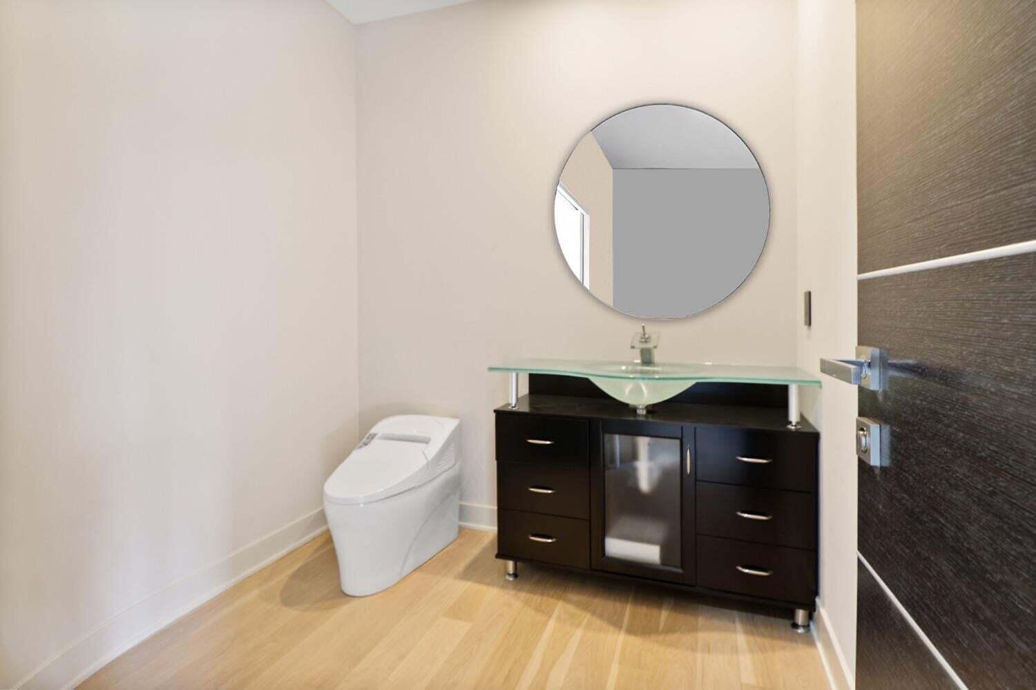 885 North 100 West Valparaiso, IN 46385 - Photo 23 of 65 a bathroom with a toilet a sink and mirror
