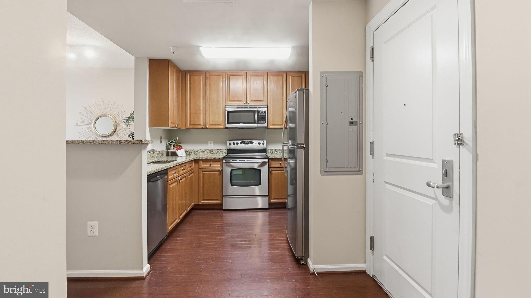 11700 Old Georgetown Road, Unit 1007 North Bethesda, MD 20852 - Photo 3 of 36 Modern kitchen with sleek finishes.