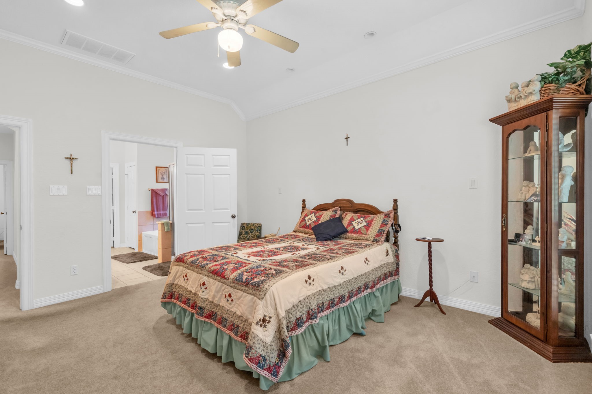 15501 Victoria's Way Montgomery, TX 77316 - Photo 18 of 36 Master bedroom with large entry to master bathroom.