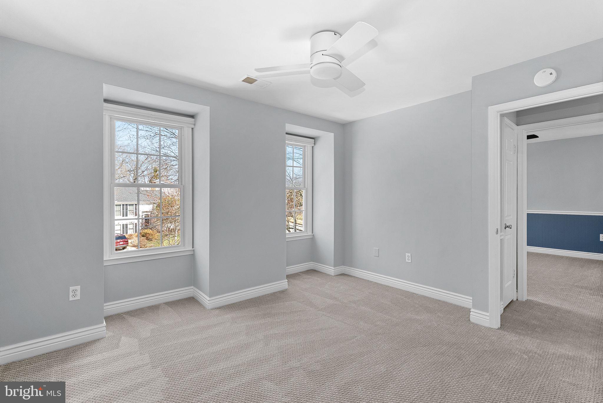 105 Country Road Sterling, VA 20165 - Photo 26 of 49 a view of an empty room with a window