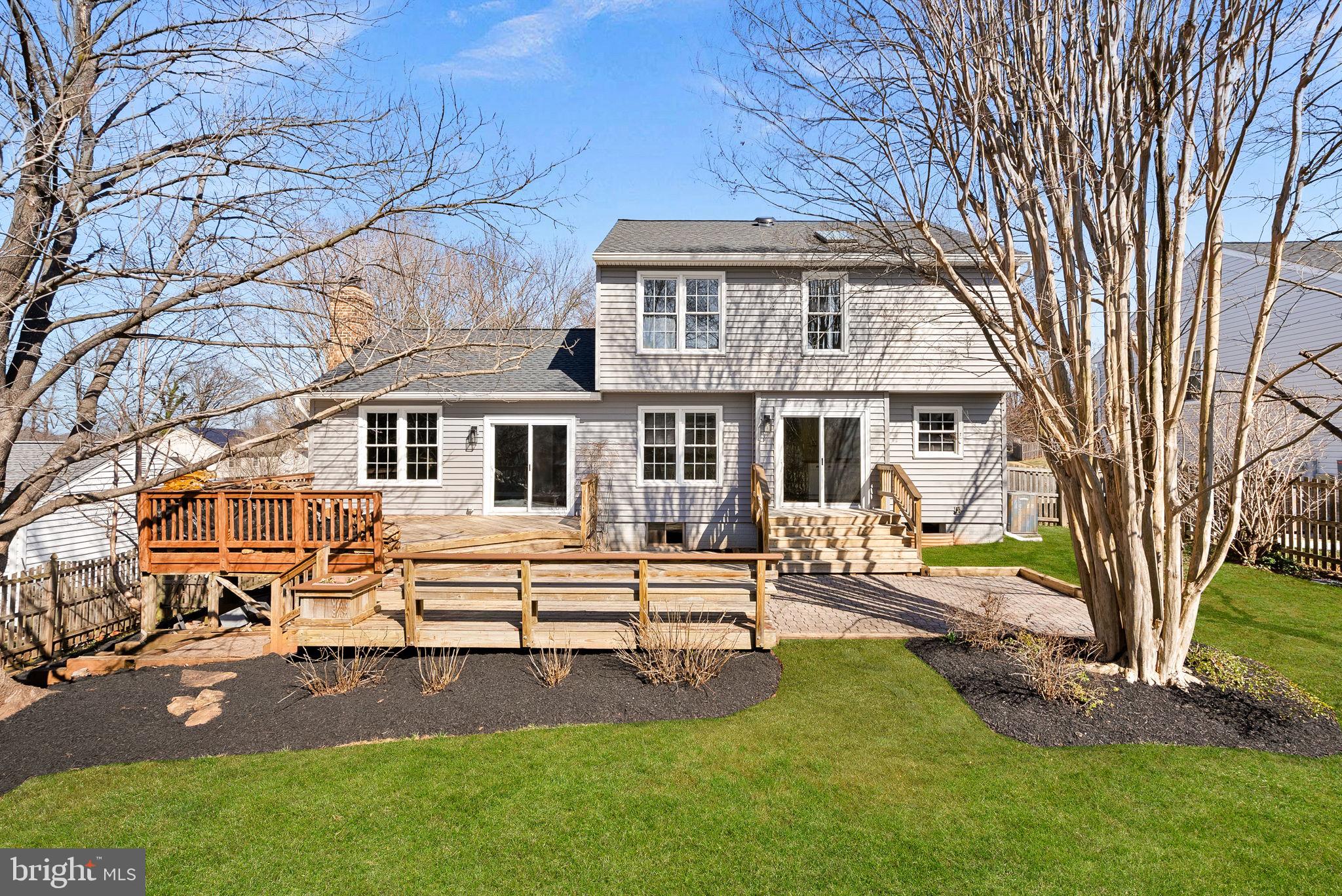 105 Country Road Sterling, VA 20165 - Photo 31 of 49 front view of a house with a yard
