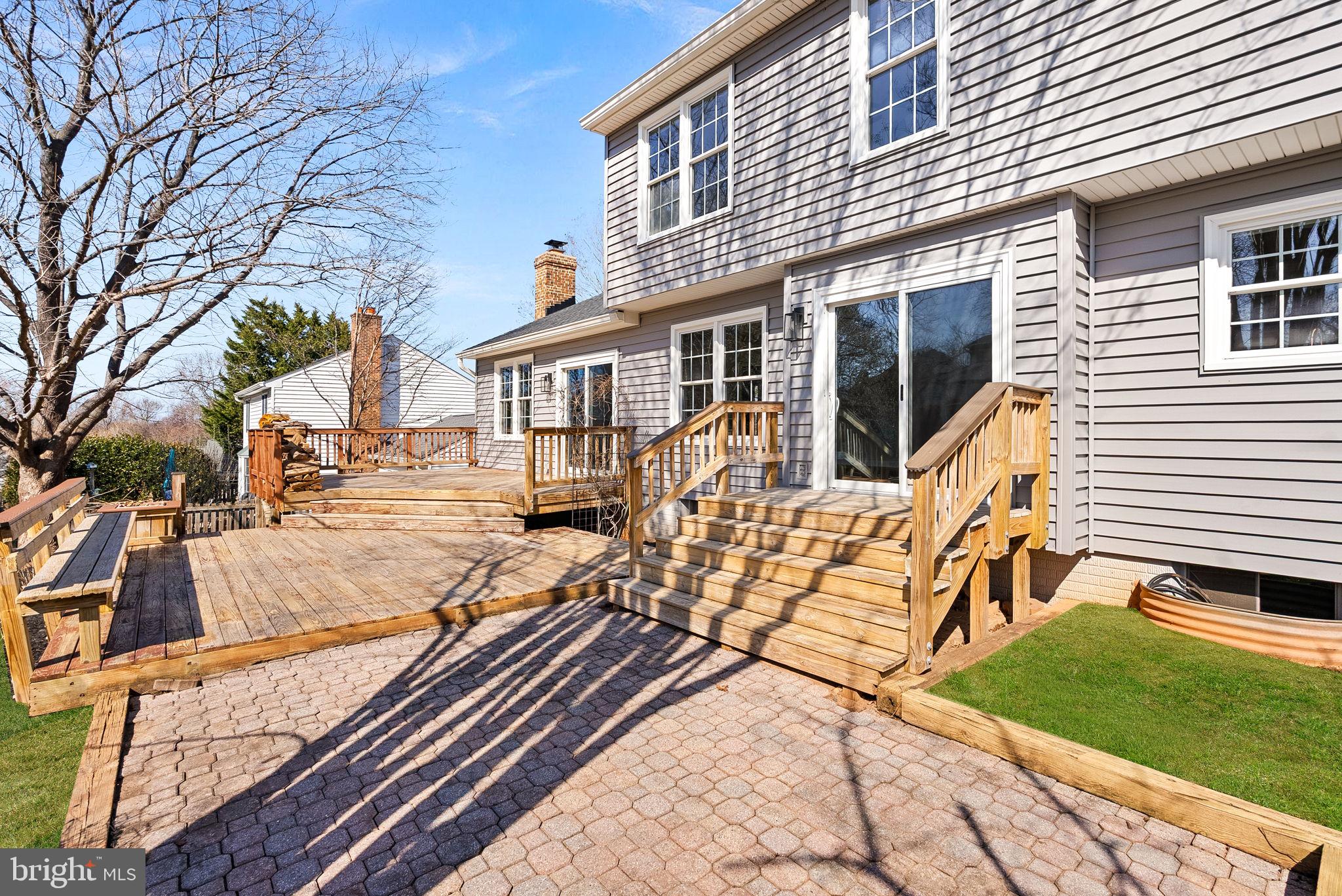 105 Country Road Sterling, VA 20165 - Photo 36 of 49 a view of a house with a patio