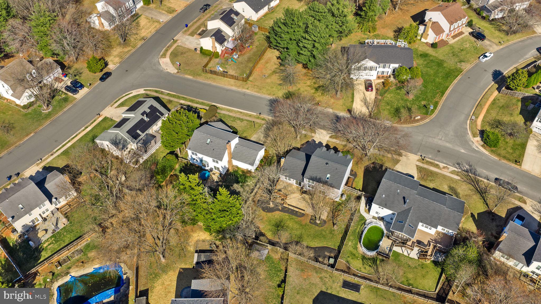 105 Country Road Sterling, VA 20165 - Photo 49 of 49 an aerial view of a swimming pool