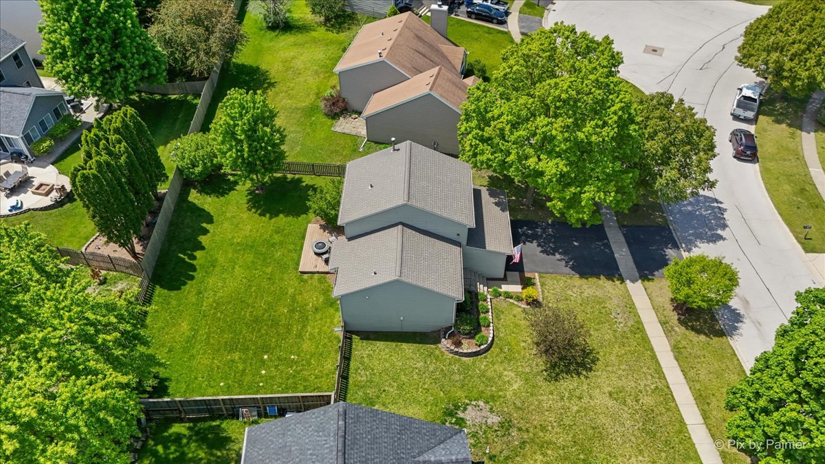 1150 Appleton Lane Geneva, IL 60134 - Photo 31 of 43 an aerial view of a house with a yard and swimming pool