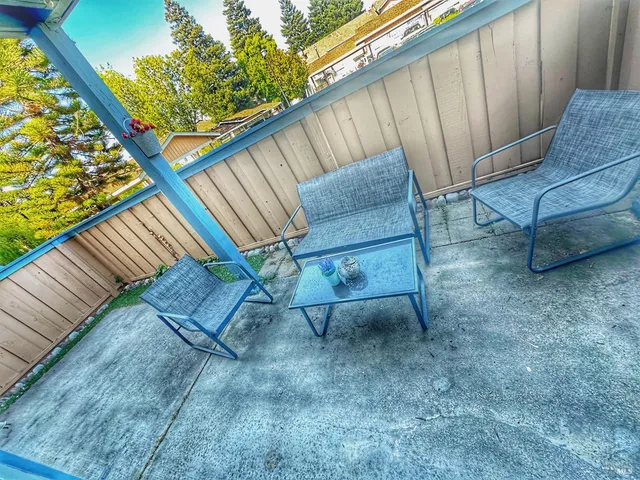 a view of outdoor space with seating area