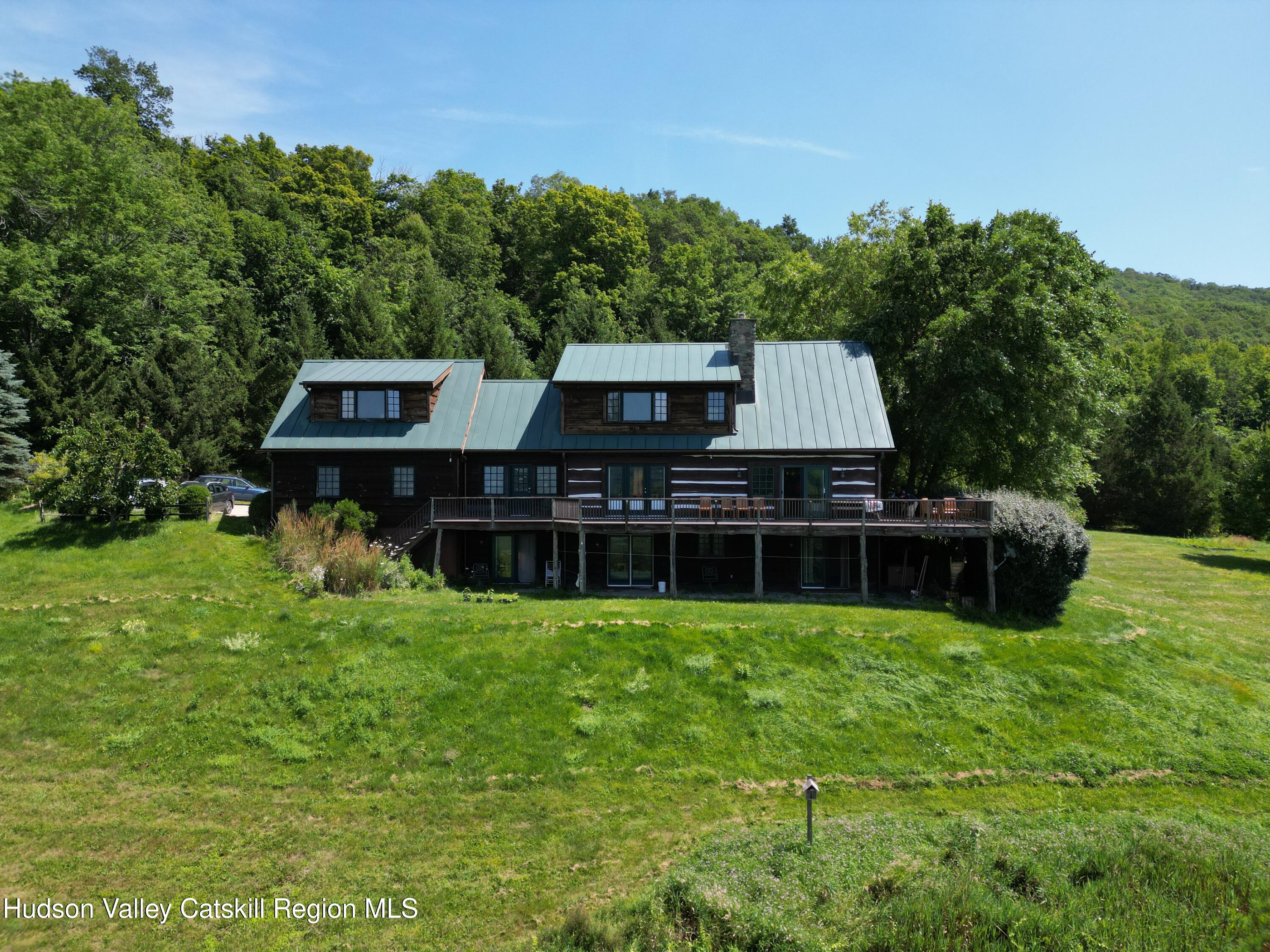 87 Kaye Road Millerton, NY 12546 - Photo 46 of 46 a view of a house with a backyard