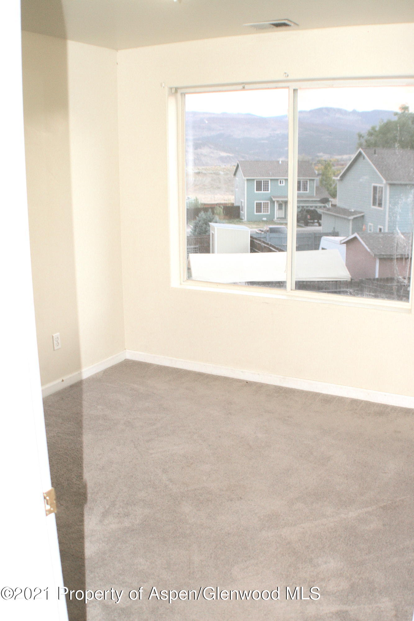 3169 West 31st Court Rifle, CO 81650 - Photo 16 of 27 a view of an empty room with a window