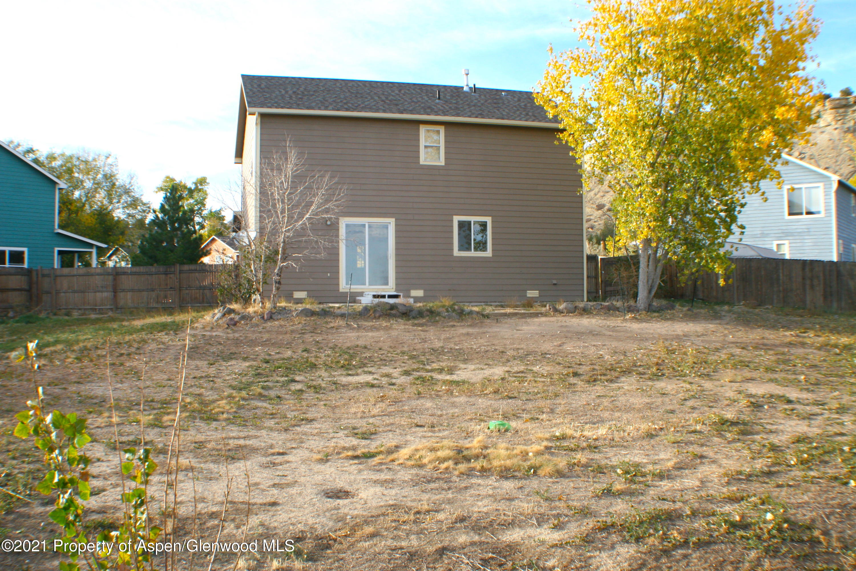 3169 West 31st Court Rifle, CO 81650 - Photo 23 of 27 a front view of house with yard