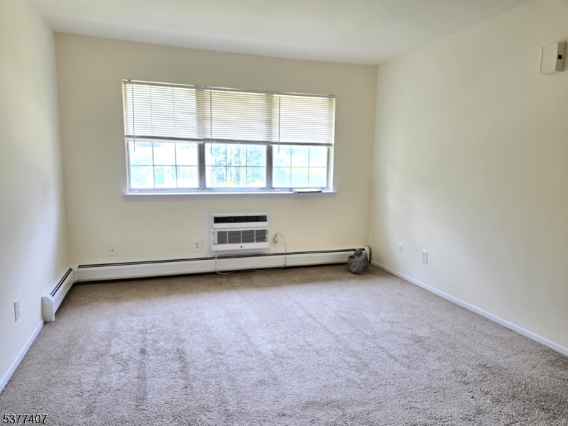 1041 Ridge Street, Unit A 19 Phillipsburg, NJ 08865 - Photo 4 of 20 an empty room with a window