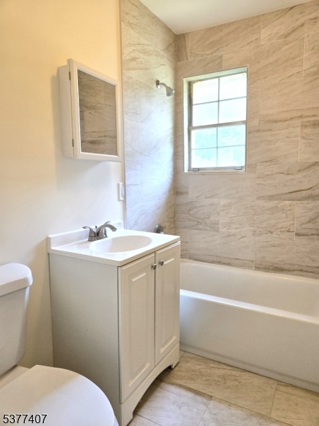 1041 Ridge Street, Unit A 19 Phillipsburg, NJ 08865 - Photo 7 of 20 a bathroom with a sink toilet and shower