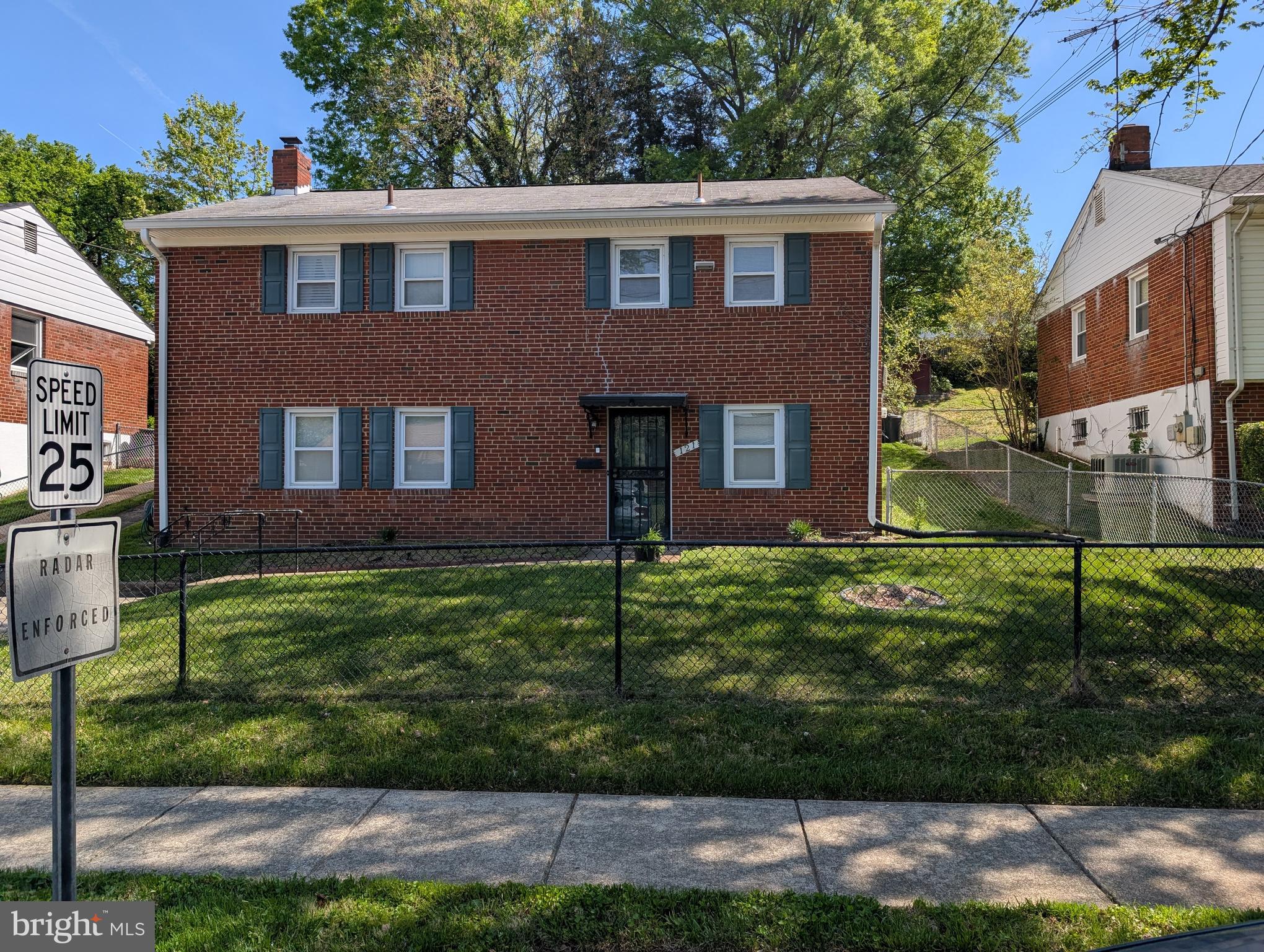 121 69th Street Capitol Heights, MD 20743 - Photo 1 of 11 a brick house that is sitting in front of a big yard