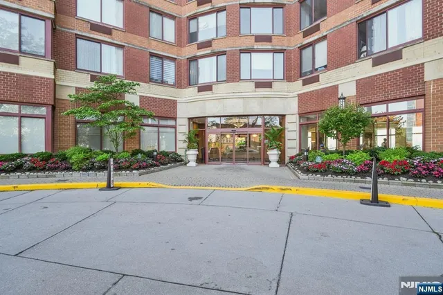 a view of an swimming pool with an outdoor seating