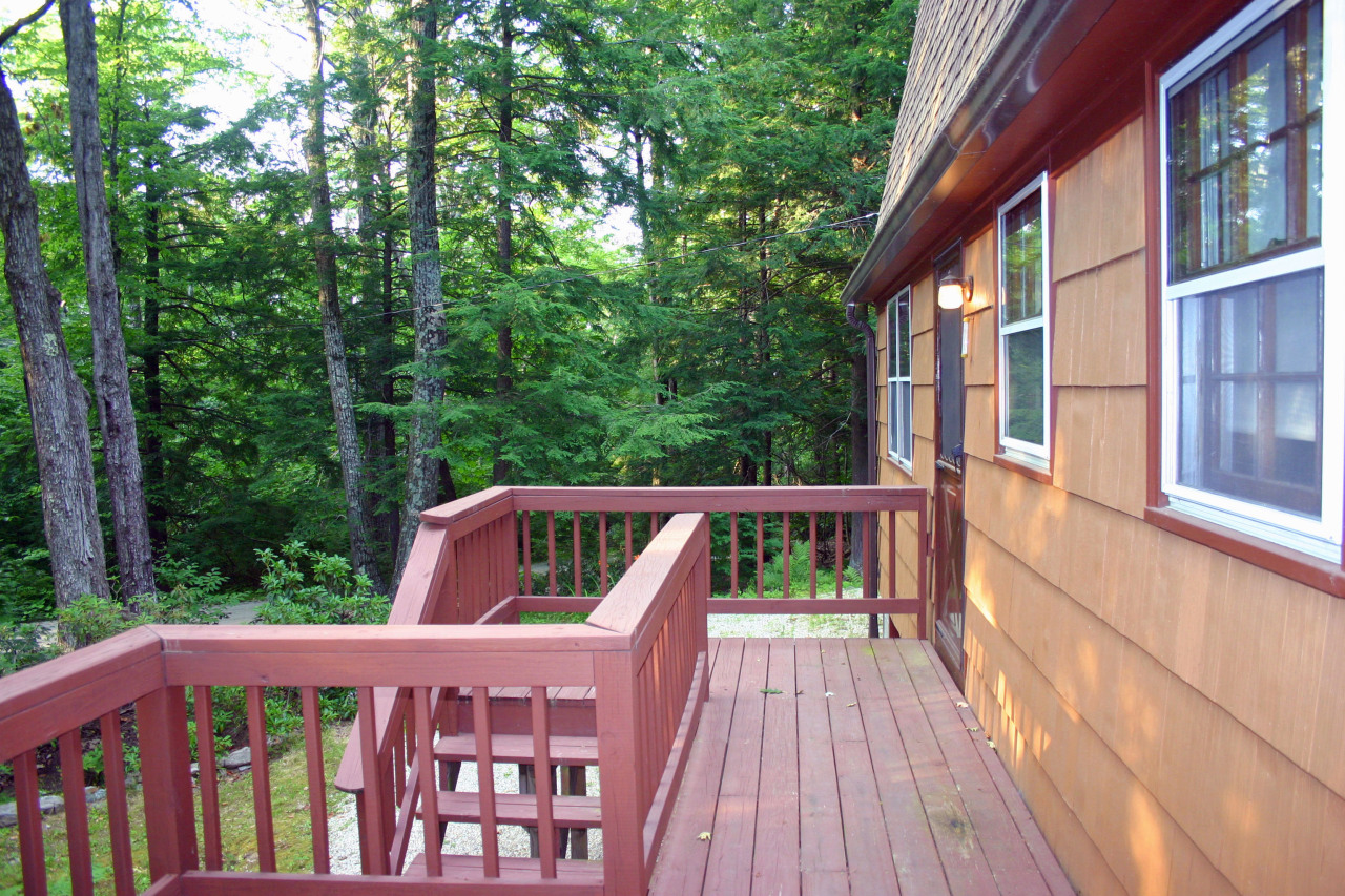 153 Stanley Road Otis, MA 01029 - Photo 11 of 19 a view of balcony with wooden floor and fence