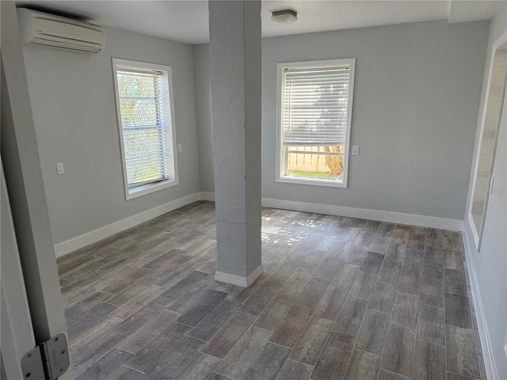 1209 1st Street Indian Rocks Beach, FL 33785 - Photo 7 of 8 a view of an empty room and window
