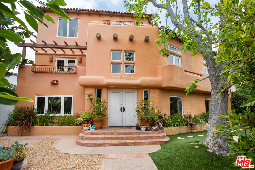 7137 Trask Avenue Playa del Rey, CA 90293 - Photo 1 of 46 a front view of a house with a yard