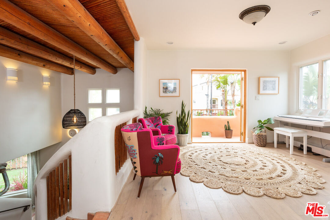 7137 Trask Avenue Playa del Rey, CA 90293 - Photo 15 of 46 a bedroom with a bed dresser and a window