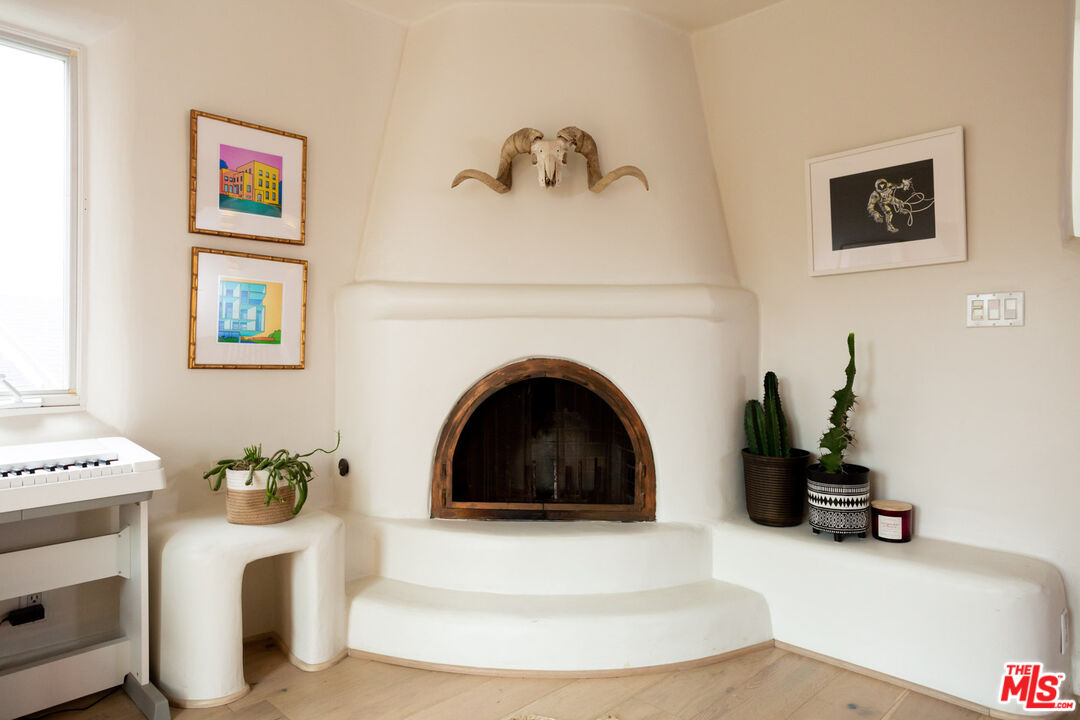 7137 Trask Avenue Playa del Rey, CA 90293 - Photo 16 of 46 a living room with furniture and a fireplace