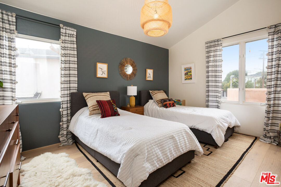 7137 Trask Avenue Playa del Rey, CA 90293 - Photo 18 of 46 a bedroom with two beds and a large window