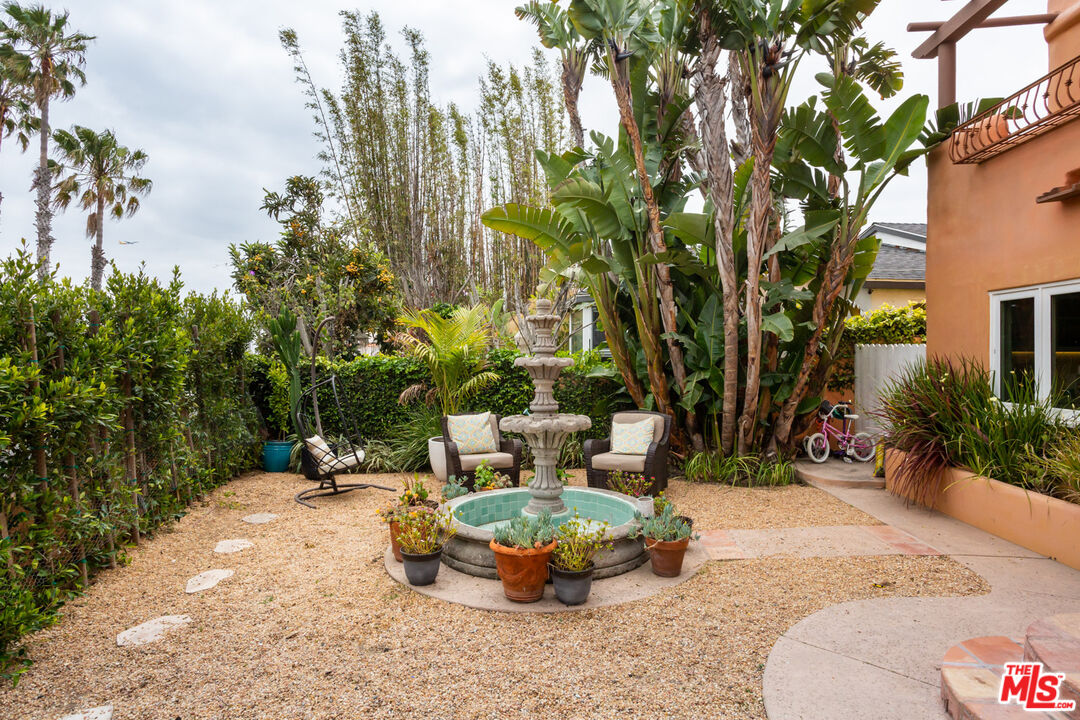 7137 Trask Avenue Playa del Rey, CA 90293 - Photo 32 of 46 a view of a backyard with garden and patio