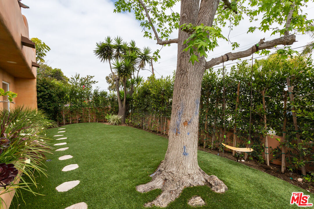 7137 Trask Avenue Playa del Rey, CA 90293 - Photo 33 of 46 a view of a backyard with large trees