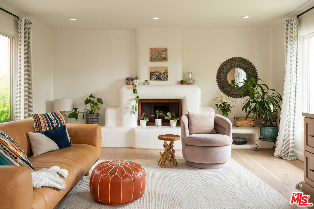 7137 Trask Avenue Playa del Rey, CA 90293 - Photo 7 of 46 a living room with furniture and a fireplace