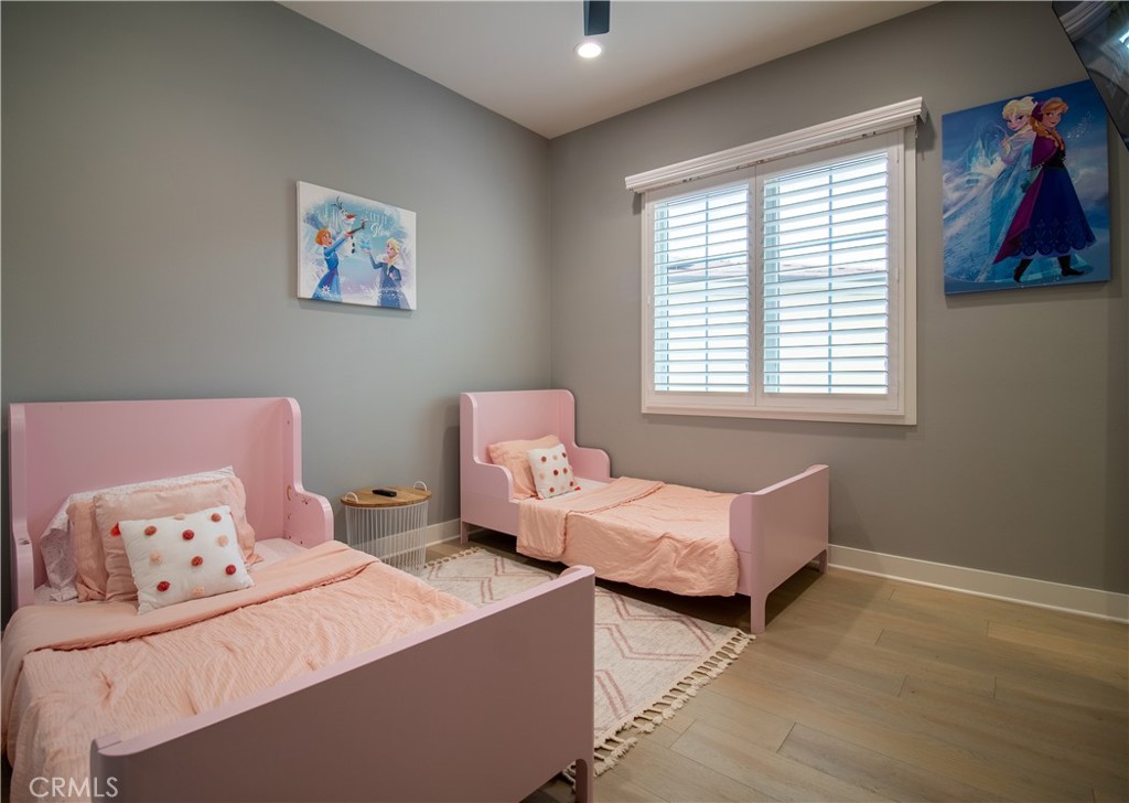 51 Egret Irvine, CA 92618 - Photo 18 of 24 a bedroom with two beds and a large window