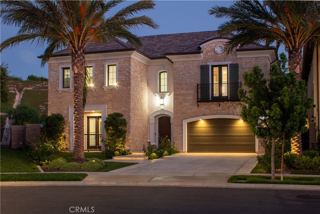 51 Egret Irvine, CA 92618 - Photo 2 of 24 a front view of a house with a yard