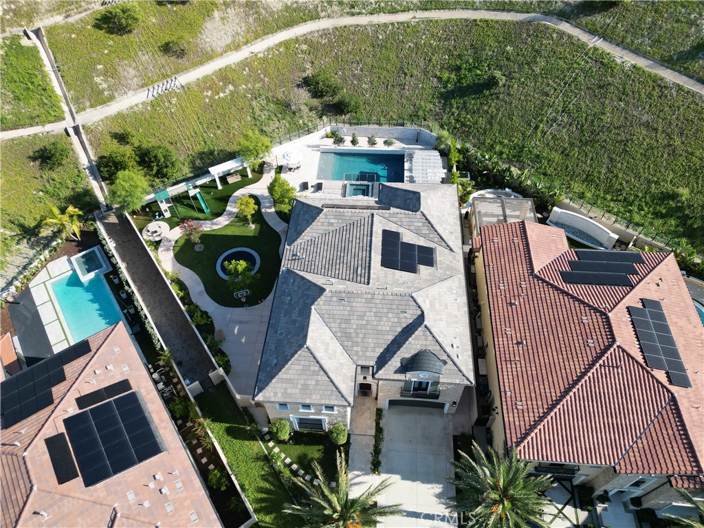 51 Egret Irvine, CA 92618 - Photo 3 of 24 an aerial view of a house with outdoor space