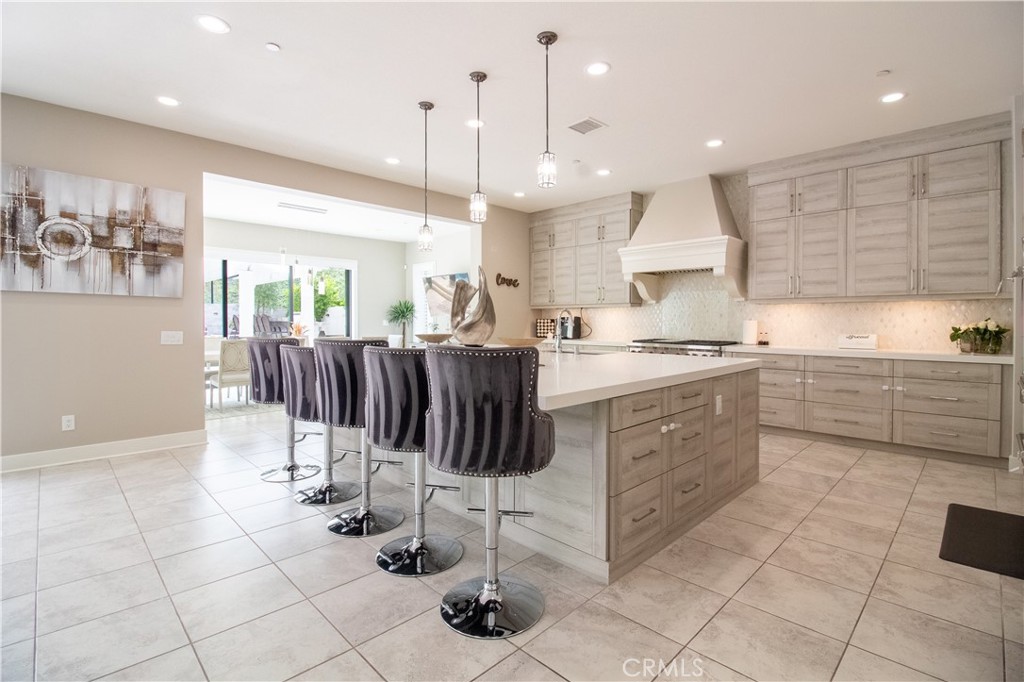 51 Egret Irvine, CA 92618 - Photo 7 of 24 a kitchen with a sink cabinets and window