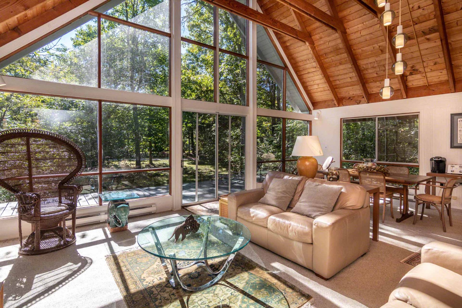 16 Kent Harbor Road Edgartown, MA 02539 - Photo 12 of 35 a living room with patio furniture and a large window