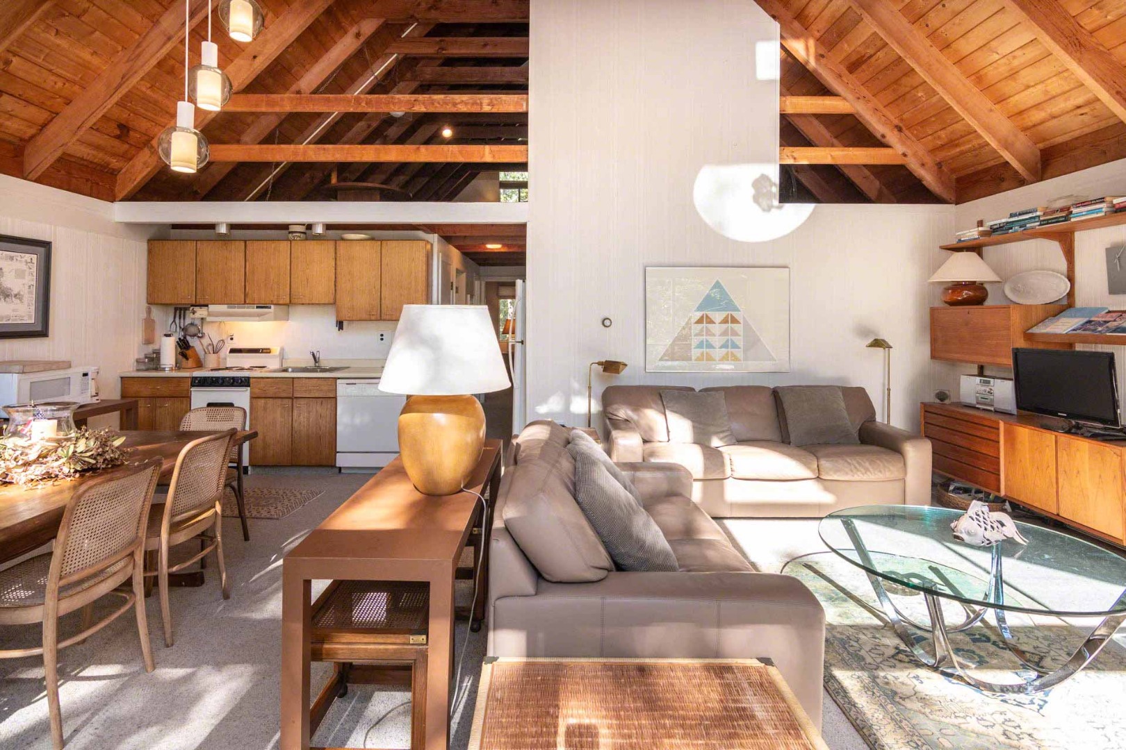 16 Kent Harbor Road Edgartown, MA 02539 - Photo 13 of 35 a living room with furniture a fireplace and a large window