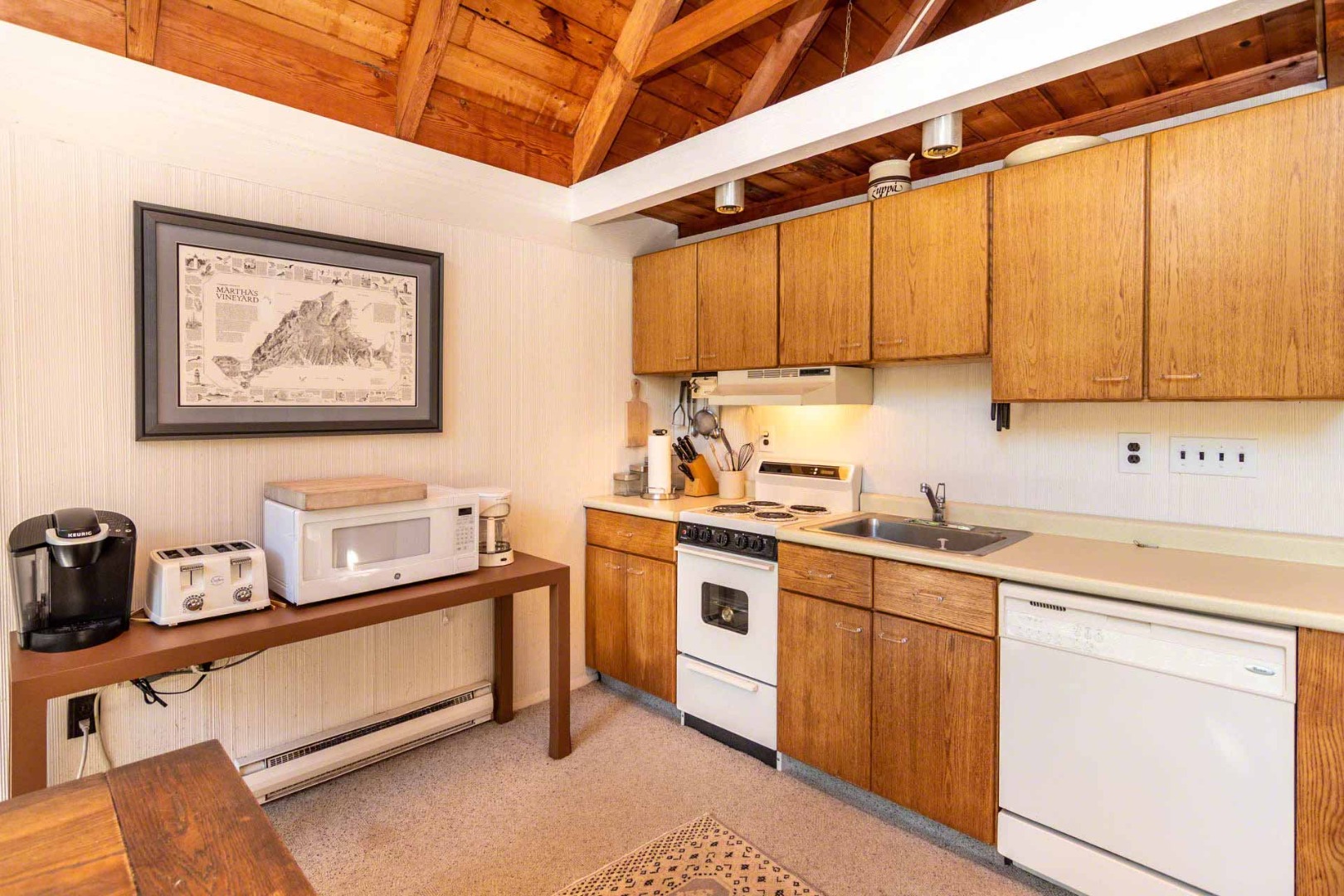 16 Kent Harbor Road Edgartown, MA 02539 - Photo 16 of 35 a kitchen with a sink cabinets and appliances