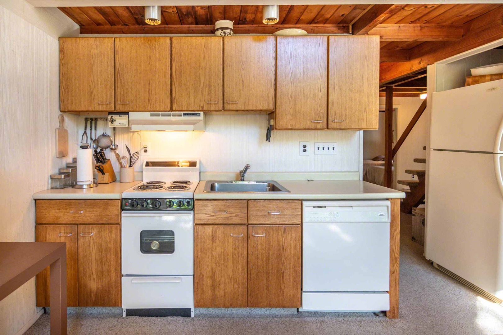 16 Kent Harbor Road Edgartown, MA 02539 - Photo 17 of 35 a kitchen with a sink a stove and a refrigerator
