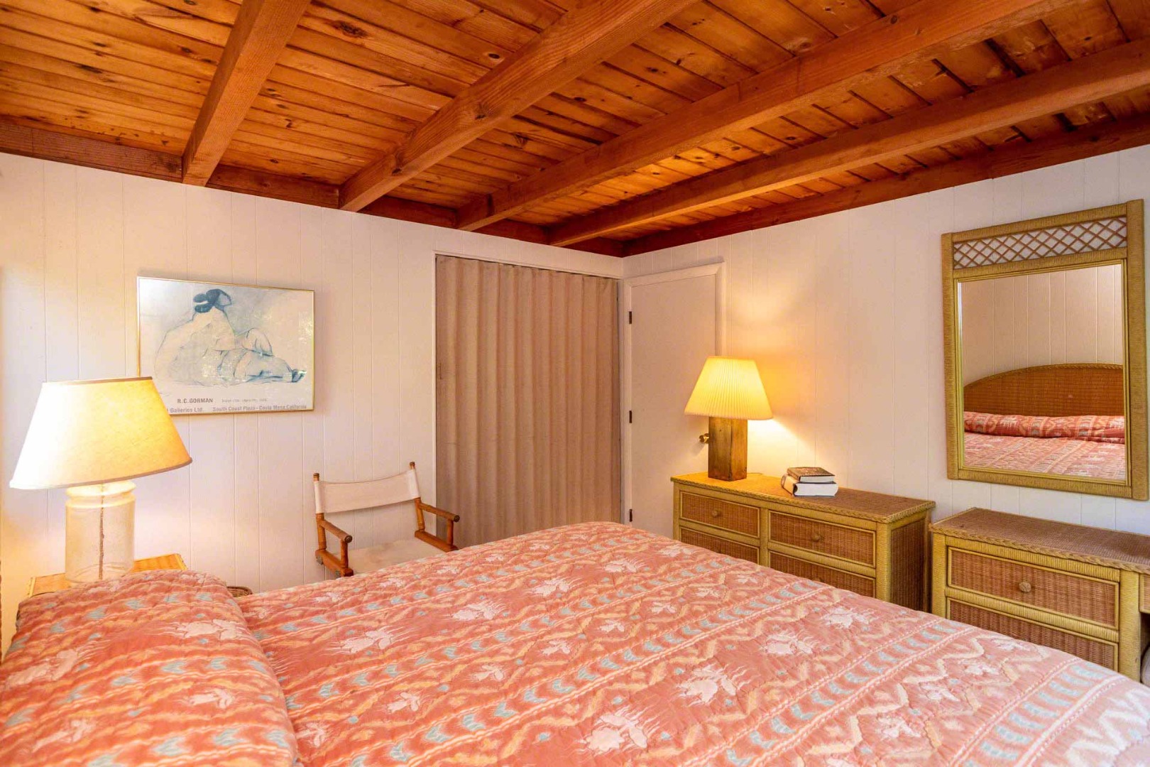 16 Kent Harbor Road Edgartown, MA 02539 - Photo 19 of 35 a bedroom with a bed and a lamp