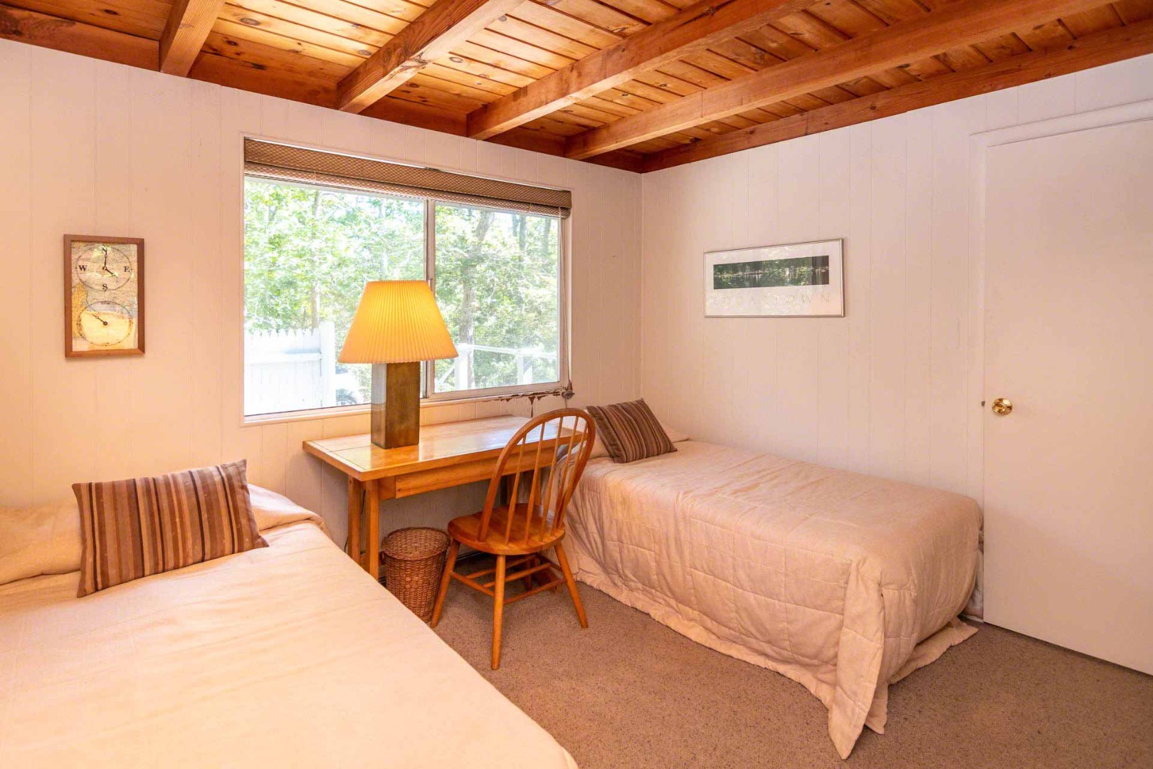 16 Kent Harbor Road Edgartown, MA 02539 - Photo 22 of 35 a bedroom with a bed and a table