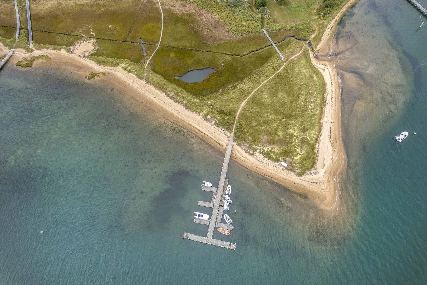 16 Kent Harbor Road Edgartown, MA 02539 - Photo 28 of 35 a room with a glass door