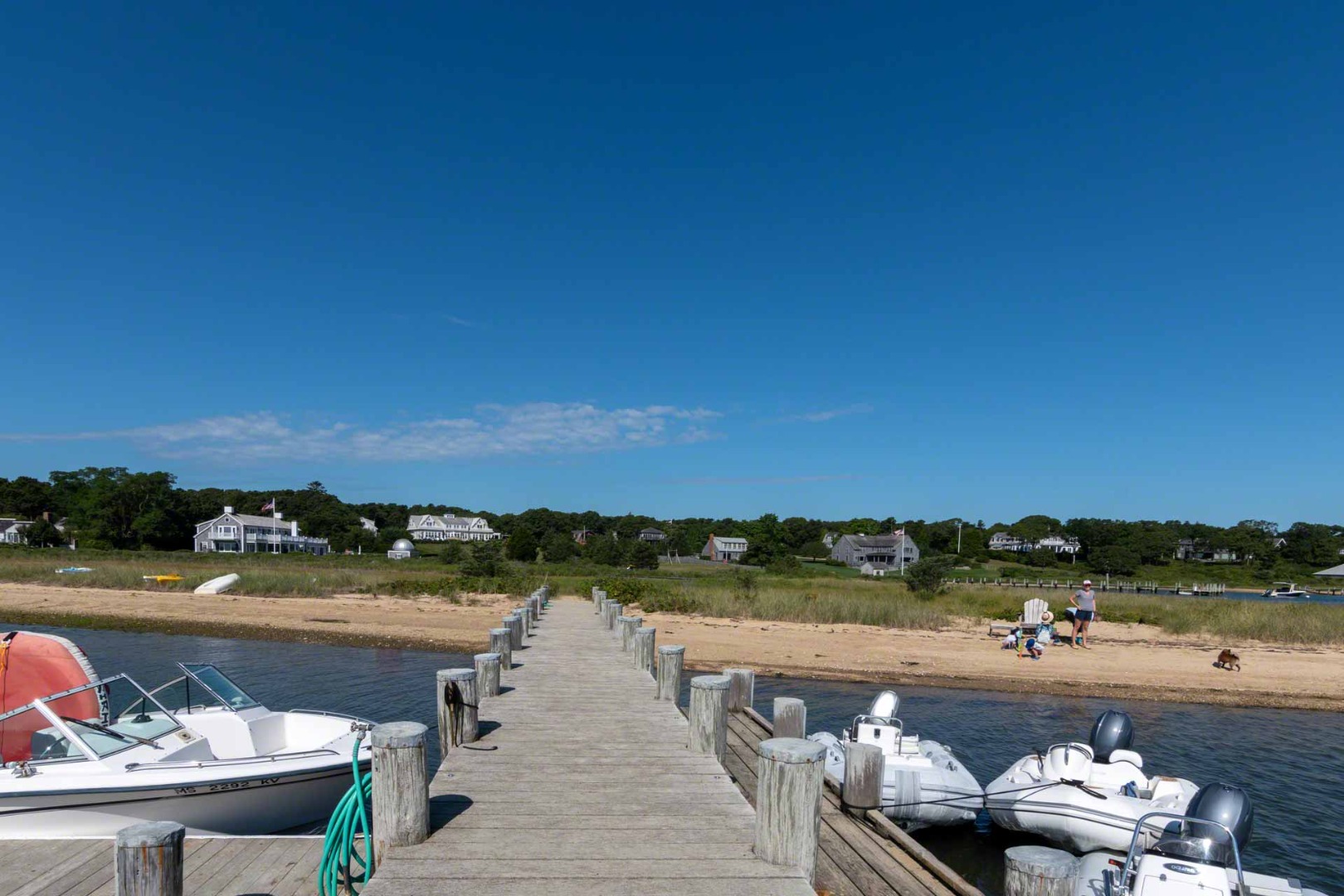 16 Kent Harbor Road Edgartown, MA 02539 - Photo 35 of 35 a view of a lake with couches and city view