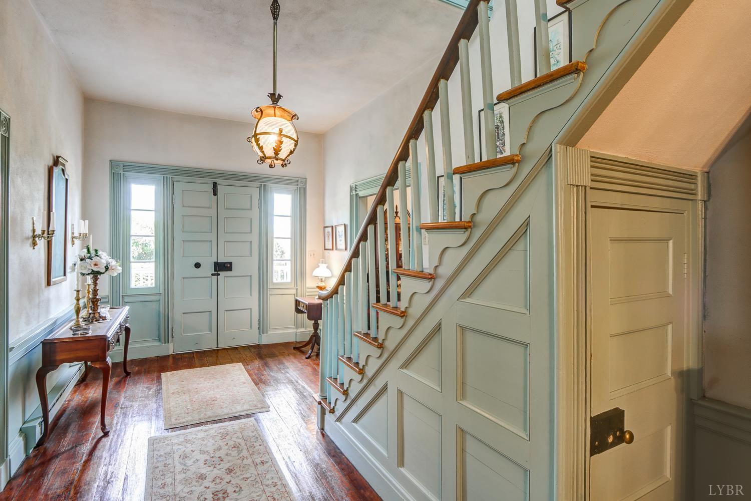 129 Lawyers Road Red House, VA 23963 - Photo 11 of 72 a view of an entryway with wooden floor and a livingroom view