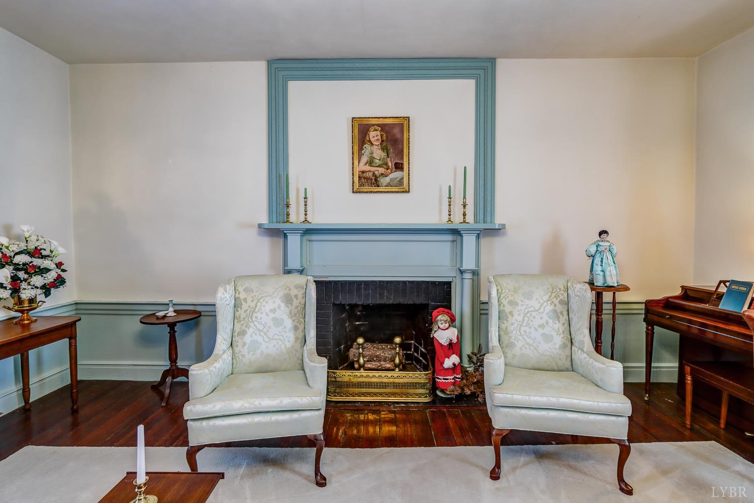 129 Lawyers Road Red House, VA 23963 - Photo 16 of 72 a living room with furniture and a fireplace