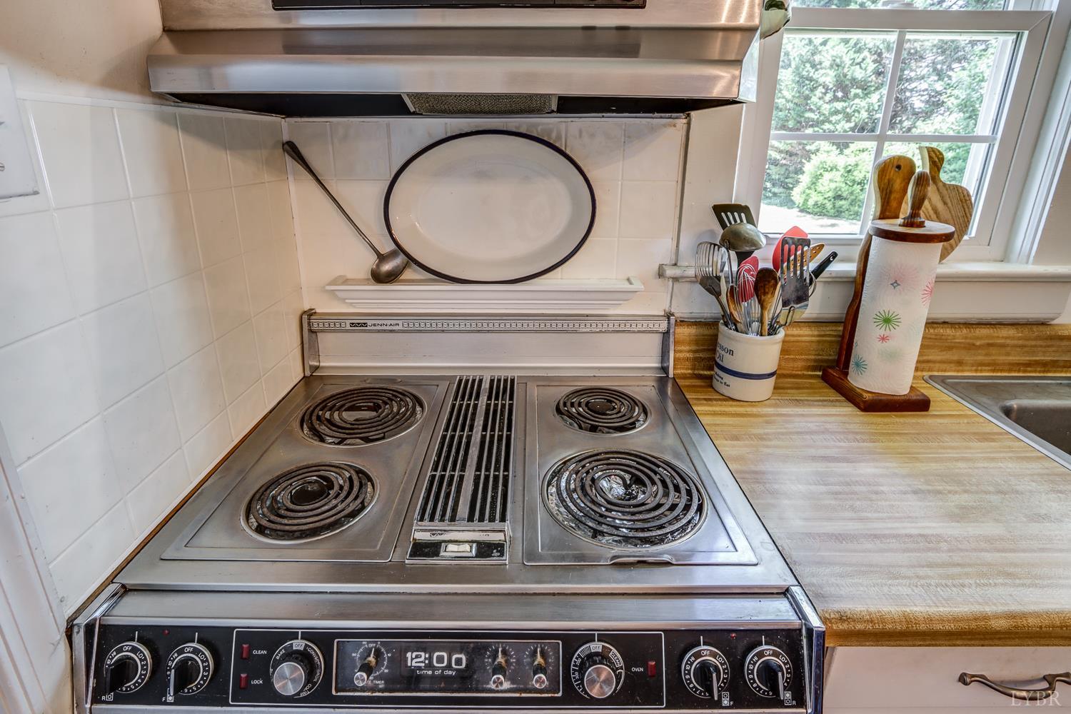 129 Lawyers Road Red House, VA 23963 - Photo 34 of 72 a stove top oven sitting inside of a kitchen