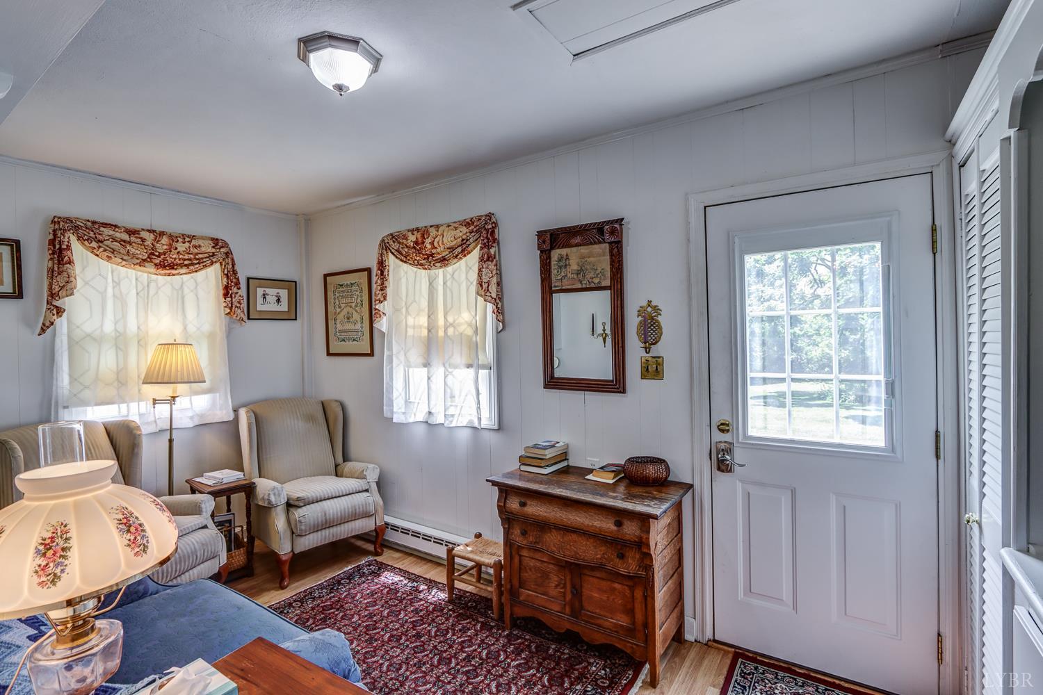 129 Lawyers Road Red House, VA 23963 - Photo 36 of 72 a living room with furniture and a window