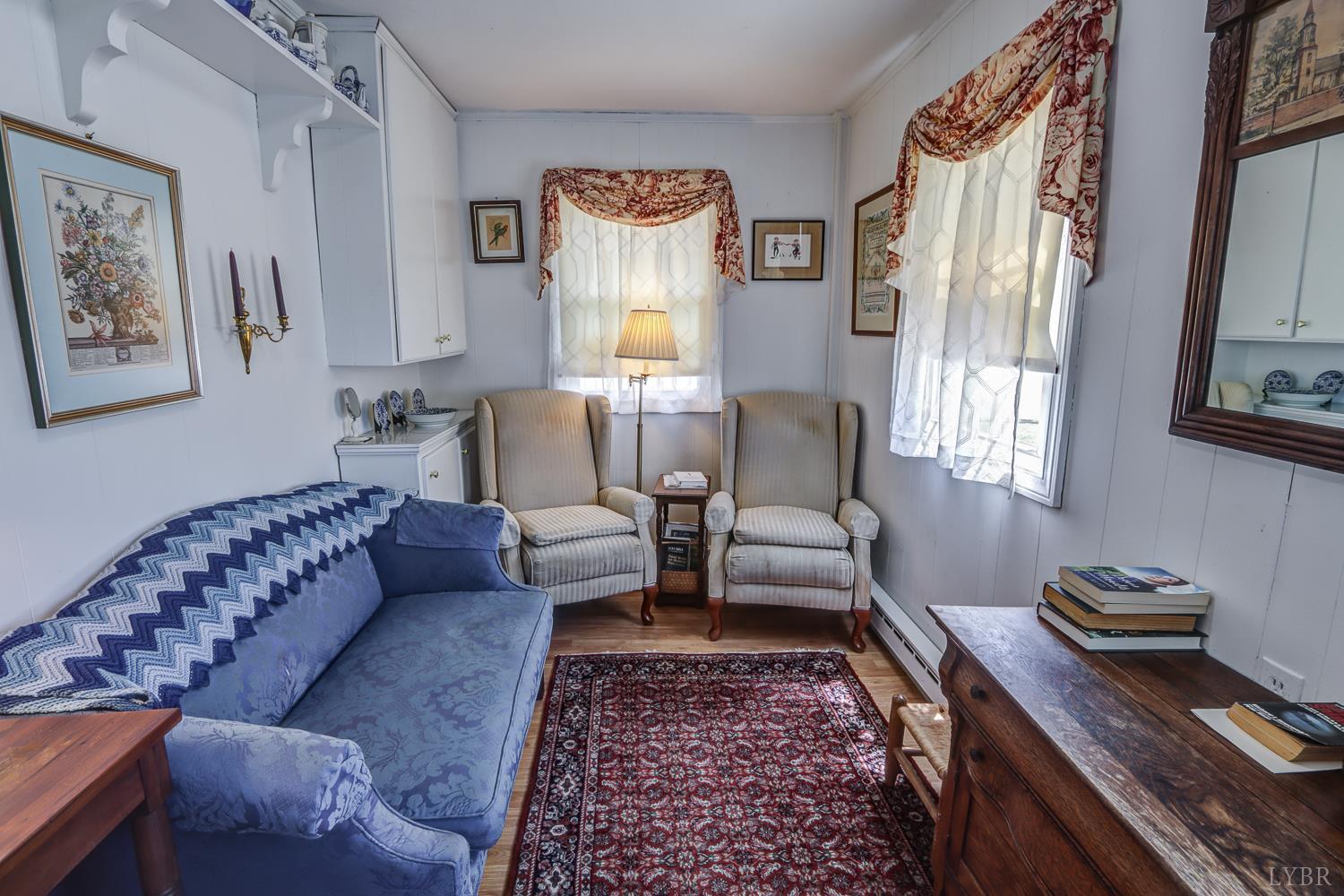 129 Lawyers Road Red House, VA 23963 - Photo 37 of 72 a living room with furniture and a window