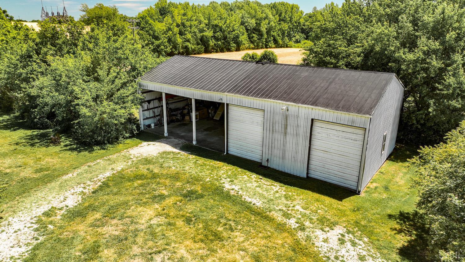 129 Lawyers Road Red House, VA 23963 - Photo 59 of 72 a view of a house with a yard and garage